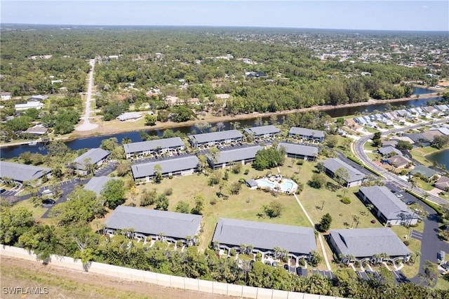 1232 Commonwealth Cir Unit P103, Naples, FL 34116 - drone / aerial view with a water view and a residential view
