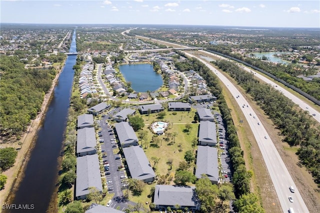 1232 Commonwealth Cir Unit P103, Naples, FL 34116 - drone / aerial view with a water view