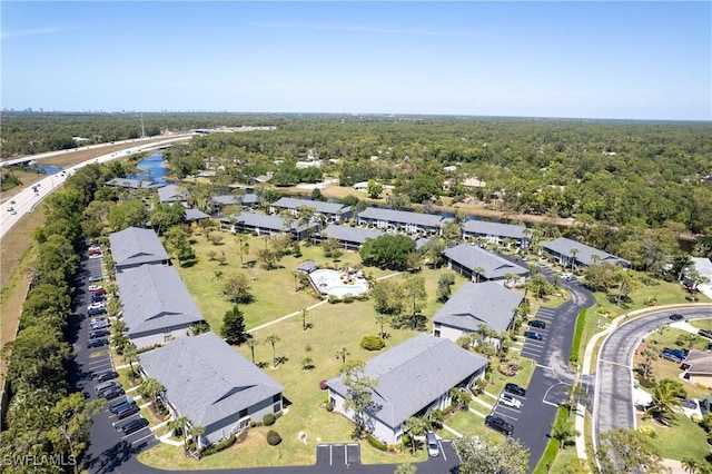 1232 Commonwealth Cir Unit P103, Naples, FL 34116 - aerial view with a residential view and a forest view