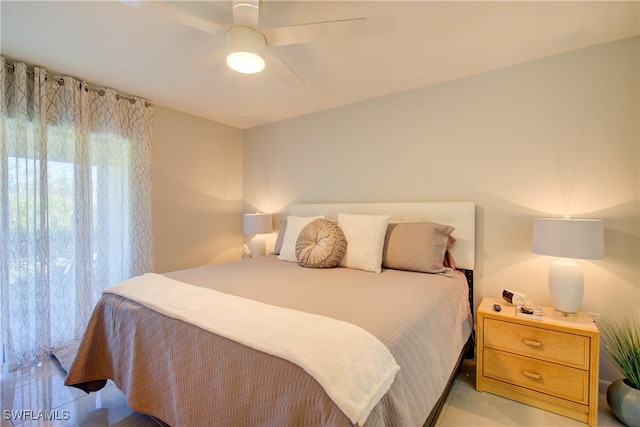 1232 Commonwealth Cir Unit P103, Naples, FL 34116 - bedroom featuring ceiling fan