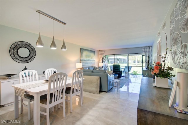 1232 Commonwealth Cir Unit P103, Naples, FL 34116 - dining space featuring visible vents