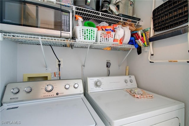 1232 Commonwealth Cir Unit P103, Naples, FL 34116 - clothes washing area with laundry area and separate washer and dryer