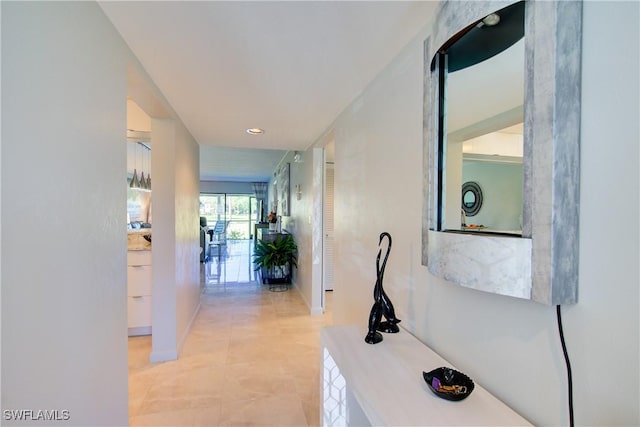 1232 Commonwealth Cir Unit P103, Naples, FL 34116 - hallway with baseboards