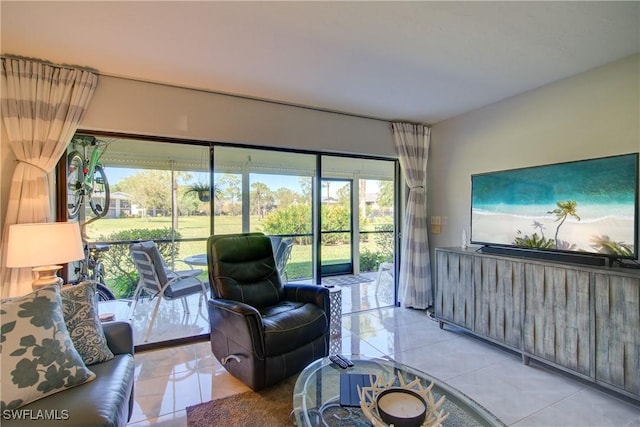 1232 Commonwealth Cir Unit P103, Naples, FL 34116 - living area featuring light tile patterned floors