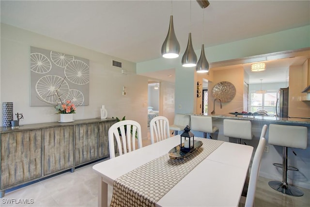 1232 Commonwealth Cir Unit P103, Naples, FL 34116 - dining room with visible vents