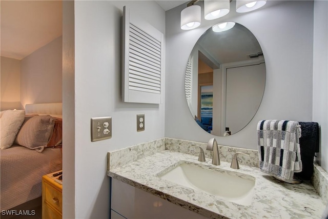 1232 Commonwealth Cir Unit P103, Naples, FL 34116 - bathroom featuring visible vents and vanity