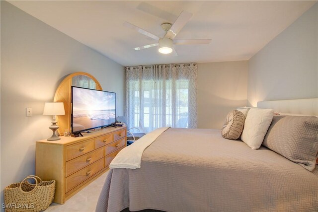 1232 Commonwealth Cir Unit P103, Naples, FL 34116 - bedroom with a ceiling fan