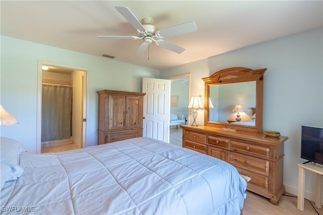 bedroom featuring visible vents, a ceiling fan, and baseboards