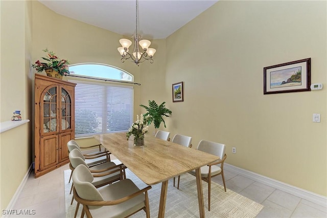 1368 Grebe Dr, Punta Gorda, FL 33950 - dining room with an inviting chandelier, light tile patterned floors, and baseboards