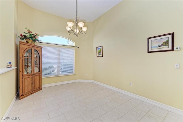 1368 Grebe Dr, Punta Gorda, FL 33950 - unfurnished room featuring a chandelier and baseboards