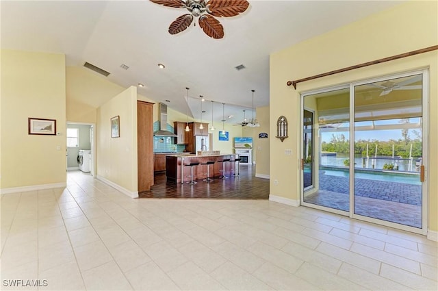 1368 Grebe Dr, Punta Gorda, FL 33950 - living area with plenty of natural light, visible vents, and ceiling fan