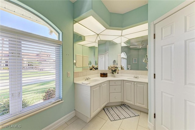 1368 Grebe Dr, Punta Gorda, FL 33950 - bathroom featuring a sink, plenty of natural light, and tile patterned floors