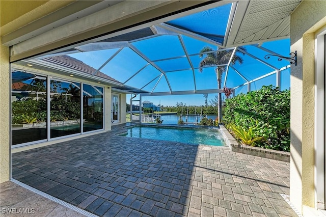 1368 Grebe Dr, Punta Gorda, FL 33950 - pool with glass enclosure, a patio area, and a water view