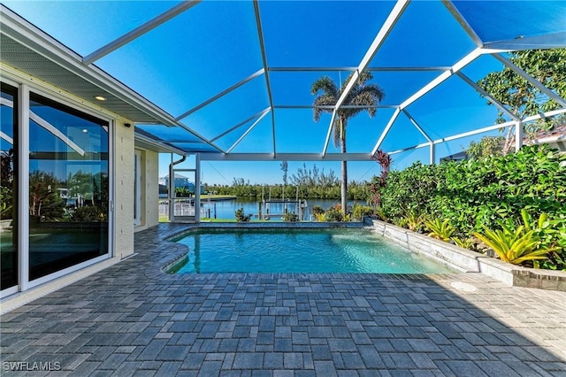 1368 Grebe Dr, Punta Gorda, FL 33950 - outdoor pool with a patio area, a lanai, and a water view