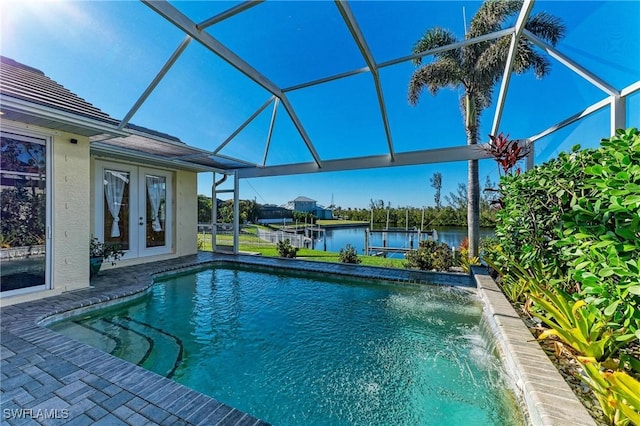 1368 Grebe Dr, Punta Gorda, FL 33950 - pool featuring glass enclosure, a patio, french doors, and a water view