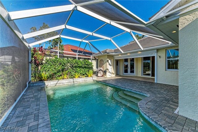 1368 Grebe Dr, Punta Gorda, FL 33950 - pool with french doors, a lanai, and a patio area