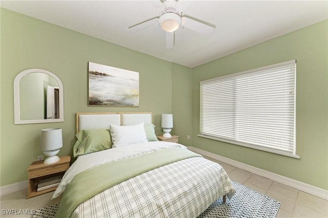 1368 Grebe Dr, Punta Gorda, FL 33950 - tiled bedroom with baseboards and a ceiling fan