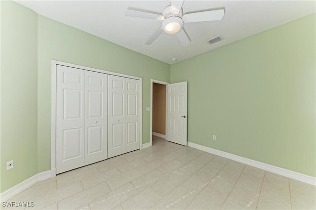 1368 Grebe Dr, Punta Gorda, FL 33950 - unfurnished bedroom featuring a closet, visible vents, a ceiling fan, and baseboards