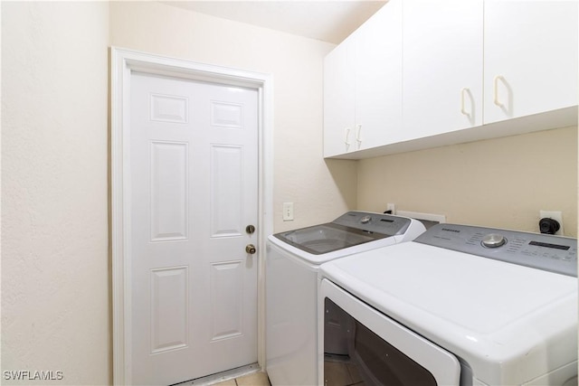 209 Pinehurst Cir, Naples, FL 34113 - laundry area with cabinet space and washer and dryer