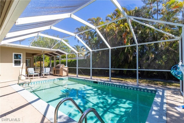 209 Pinehurst Cir, Naples, FL 34113 - pool with glass enclosure, a grill, and a patio