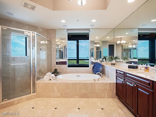 5051 Pelican Colony Blvd Unit 301, Bonita Springs, FL 34134 - full bathroom featuring a bath, visible vents, a healthy amount of sunlight, and a stall shower