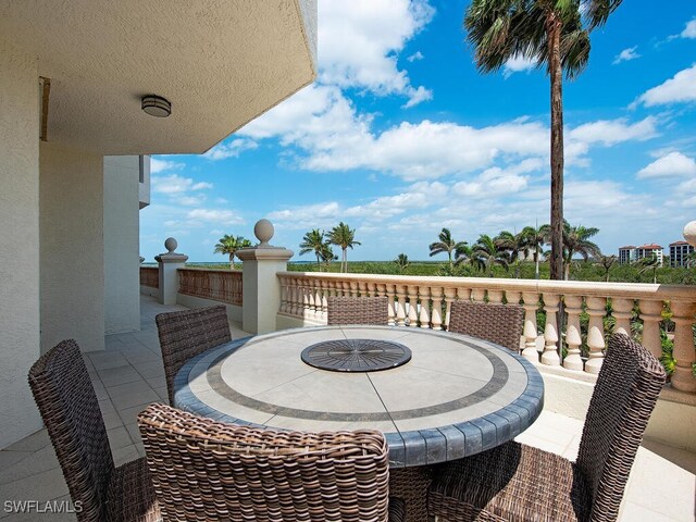 5051 Pelican Colony Blvd Unit 301, Bonita Springs, FL 34134 - view of patio / terrace with outdoor dining space