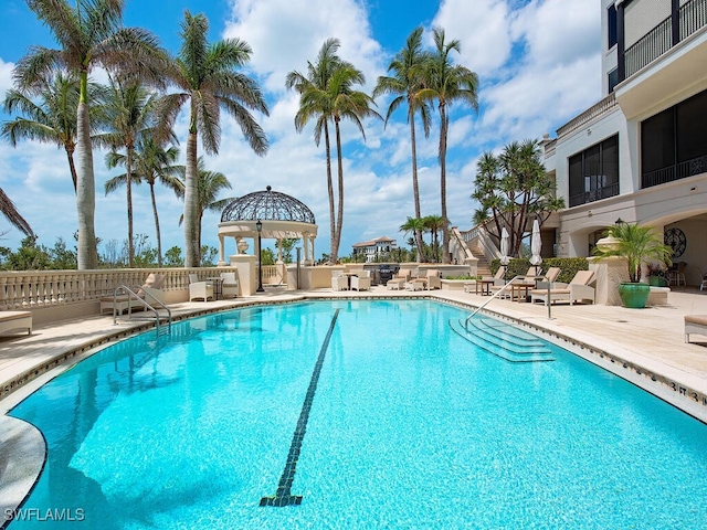 5051 Pelican Colony Blvd Unit 301, Bonita Springs, FL 34134 - community pool with a patio