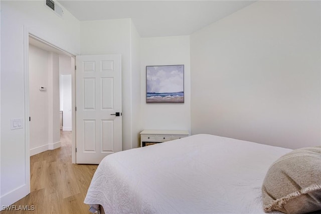16451 Millstone Cir Unit 101, Fort Myers, FL 33908 - bedroom featuring light wood-type flooring and baseboards