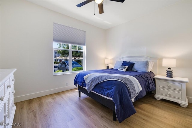16451 Millstone Cir Unit 101, Fort Myers, FL 33908 - bedroom with light wood-type flooring, baseboards, and a ceiling fan