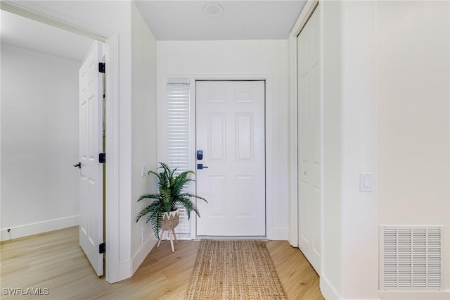 16451 Millstone Cir Unit 101, Fort Myers, FL 33908 - hall featuring light wood-style flooring and baseboards