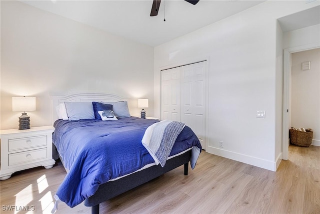 16451 Millstone Cir Unit 101, Fort Myers, FL 33908 - bedroom featuring a closet, light wood-style floors, baseboards, and ceiling fan