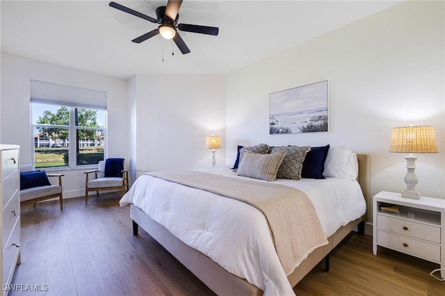 16451 Millstone Cir Unit 101, Fort Myers, FL 33908 - bedroom featuring wood finished floors and ceiling fan