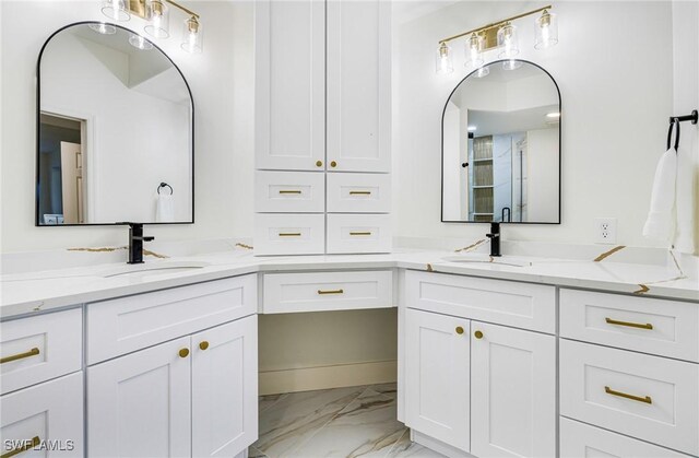 16451 Millstone Cir Unit 101, Fort Myers, FL 33908 - bathroom with marble finish floors and double vanity