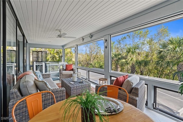 319 Nature View Ct, Fort Myers Beach, FL 33931 - sunroom featuring an outdoor hangout area, ceiling fan, and outdoor dining space
