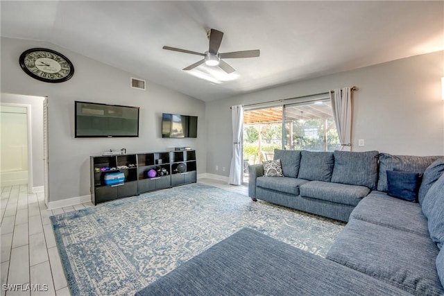 2303 NE 7th Ave, Cape Coral, FL 33909 - living area with baseboards, vaulted ceiling, visible vents, and a ceiling fan