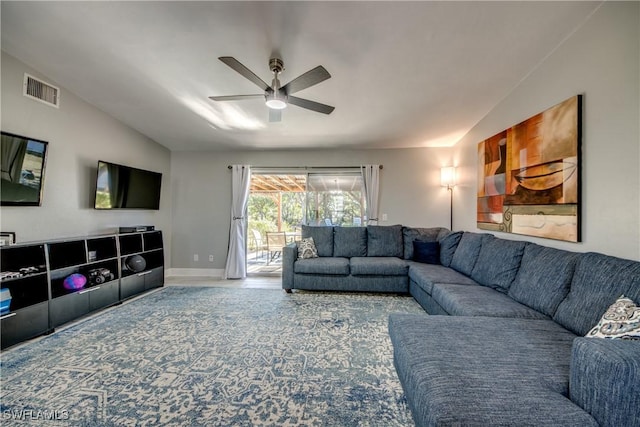 2303 NE 7th Ave, Cape Coral, FL 33909 - living room with ceiling fan, lofted ceiling, visible vents, and baseboards