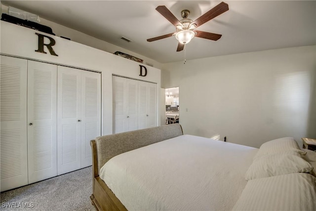 2303 NE 7th Ave, Cape Coral, FL 33909 - bedroom with ceiling fan, carpet flooring, multiple closets, and visible vents