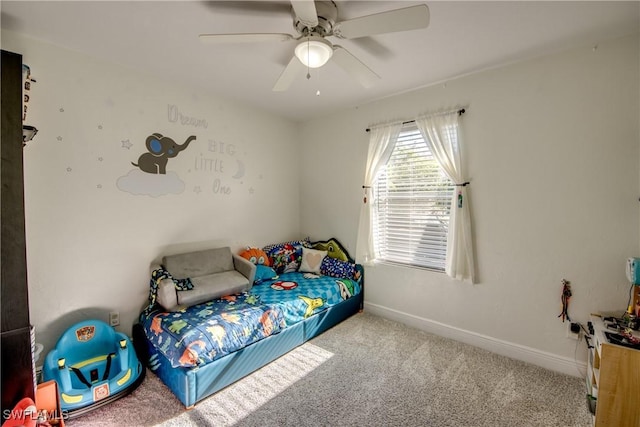 2303 NE 7th Ave, Cape Coral, FL 33909 - carpeted bedroom featuring baseboards and a ceiling fan