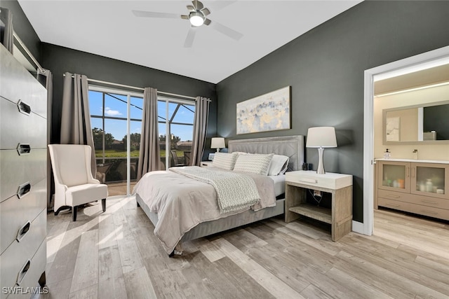 13471 Bridgeford Ave, Bonita Springs, FL 34135 - bedroom with connected bathroom, baseboards, light wood-style floors, and ceiling fan