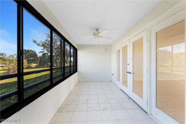 801 Islamorada Blvd Unit 21A, Punta Gorda, FL 33955 - unfurnished sunroom featuring french doors and ceiling fan