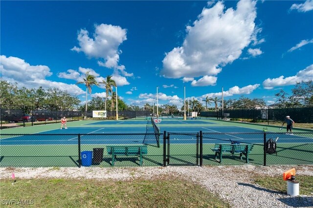 801 Islamorada Blvd Unit 21A, Punta Gorda, FL 33955 - view of tennis court with community basketball court