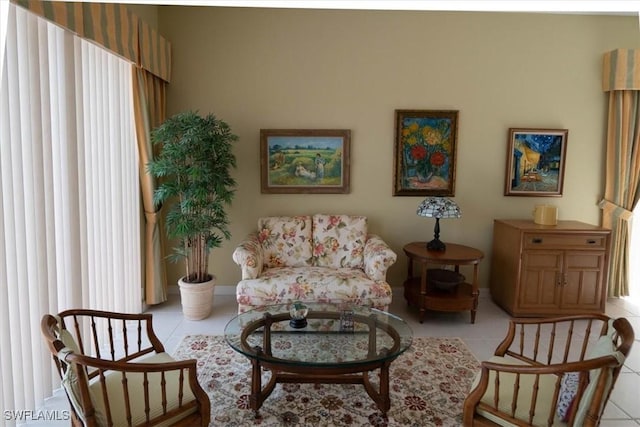 sitting room featuring tile patterned flooring