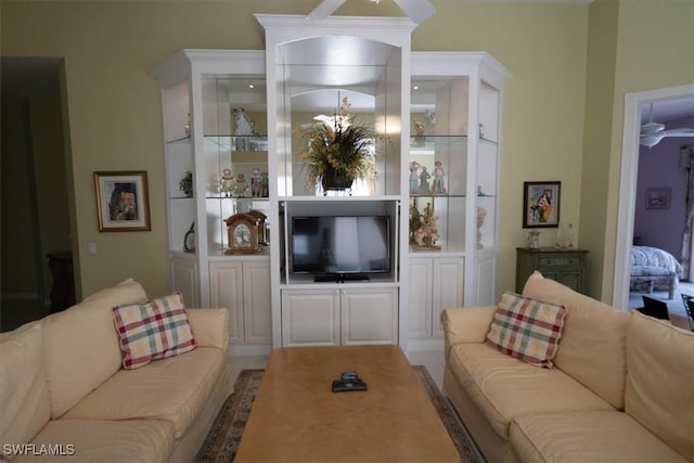 living room with a ceiling fan