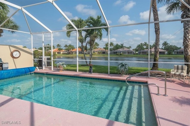 view of pool with a water view, a lanai, and a patio area