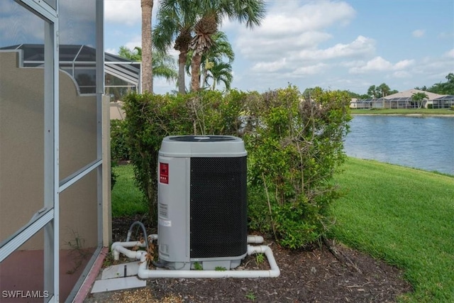 exterior details featuring cooling unit and stucco siding