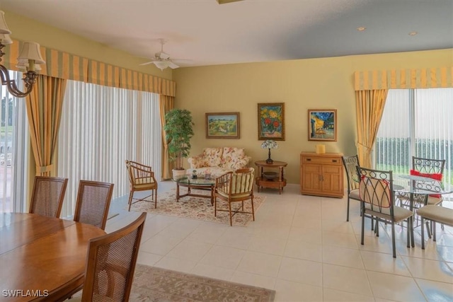 dining room featuring light tile patterned floors and ceiling fan