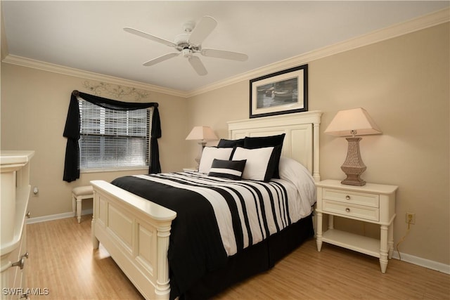 bedroom with baseboards, a ceiling fan, light wood-style flooring, and crown molding