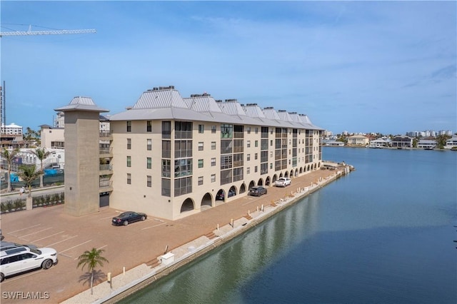 exterior space with a water view