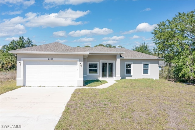 view of front facade featuring concrete driveway, stucco siding, an attached garage, french doors, and a front yard