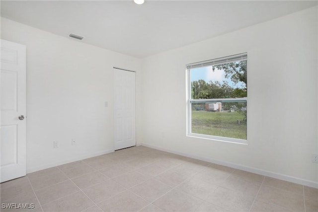 1861 Lillie St, Fort Myers, FL 33916 - spare room with light tile patterned flooring, baseboards, and visible vents
